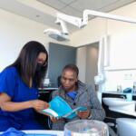 Dr Ngcingwana consulting with a patient in the examination room.